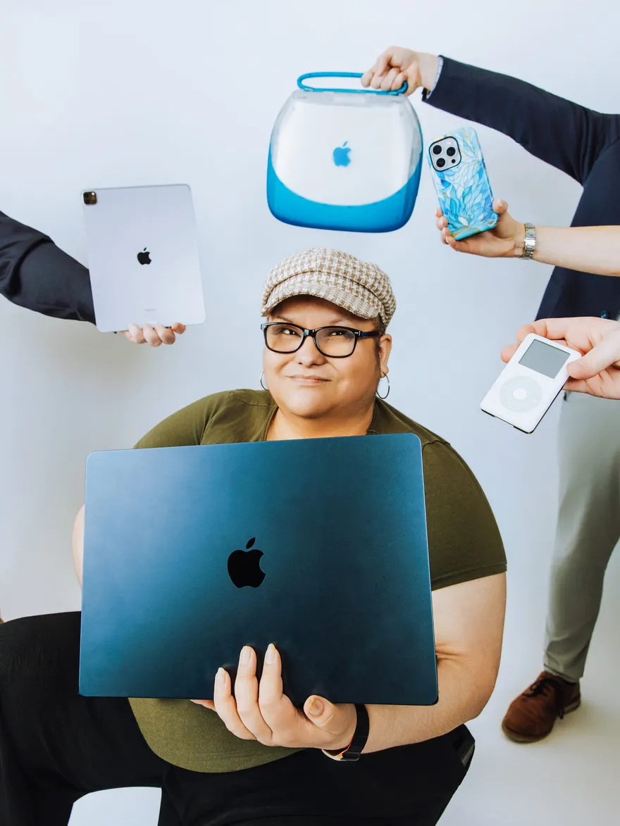 Norma Saavedra surrounded by floating Apple devices